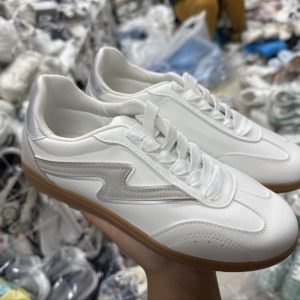 Crisp White Sneakers with Silver Lightning Bolt